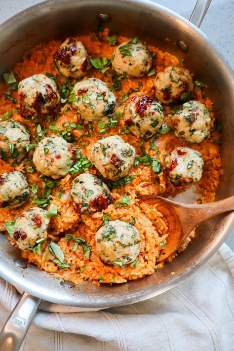 I have tons of meatball recipes on my website because I find them to be the perfect protein! You can pack in so much flavor and add them to so many different recipes because they're so customizable. These tomato basil chicken meatballs with creamy tomato rice, however, might be my new favorite form of meatballs. Creamy Tomato Meatballs, Sundried Tomato Meatballs, Chicken Meatballs With Rice, Trader Joes Chicken Meatball Recipe, Trader Joe’s Chicken Meatballs, Meatball And Rice Recipes, Basil Recipes Dinner Ideas, Basil Meatballs, Chicken Meatball Recipe