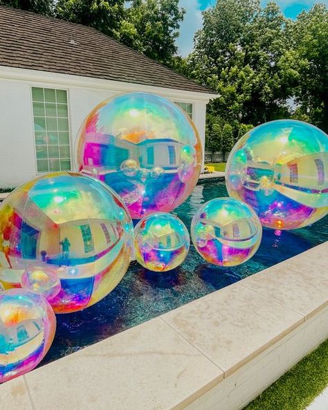 Balloon Therapy on Instagram: "that new new ✨ NEW RENTAL ALERT 😍 #balloontherapy #newrentalalert These stunning iridescent orbs are now available for rent - they're perfect for pool parties and mermaid vibes! DM us for more info to rent the set or individual 2, 4, 6, & 8 ft orbs for your next event! Stay tuned to tomorrow's content to see how they can be incorporated into your event without a pool 🤩 • • • • • #dallasevents #dallaseventrentals #dfwevents #dallassocial #dallaseventplanner #event Galaxy Pool Party, Iridescent Balloon Garland, Iridescent Balloons, Balloon Therapy, Pool Balloons, Mermaid Pool Party, Neon Pool Parties, Pool Party Adults, Mermaid Pool Parties