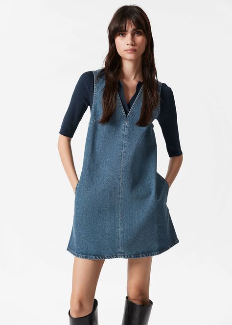 Sleeveless denim mini dress designed with an A-line silhouette, and a v-neck at the front and back. Finished with an invisible side zipper.• Slim fit Length of dress: 58.4cm / 22.9" (EU 38 / UK 10 / US 6) Denim Mini Dress, Denim Mini, Side Zipper, Designer Dresses, A Line, Slim Fit, Mini Dress, V Neck, Zipper