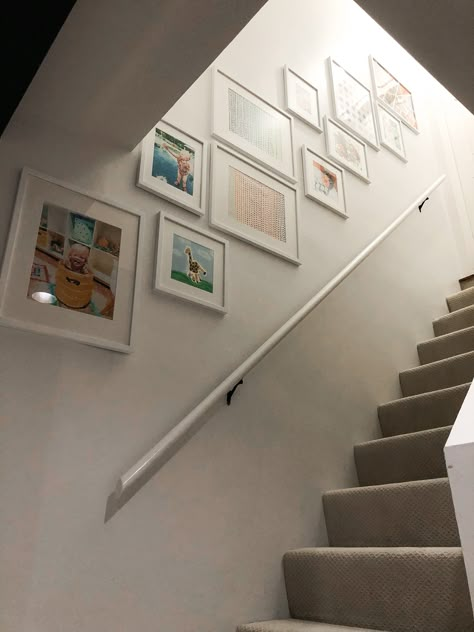 Modern Gallery Wall Using Kid’s Art! • Mindfully Gray Basement Stairs Gallery Wall, Ikea Ribba Gallery Wall Stairs, Gallery Wall Stair Landing, Stair Photo Gallery, Gallery Wall On Slanted Wall, Photo Wall On Stairs, Gallery Wall Up The Stairs, Photos Up Staircase, Stairway Picture Wall