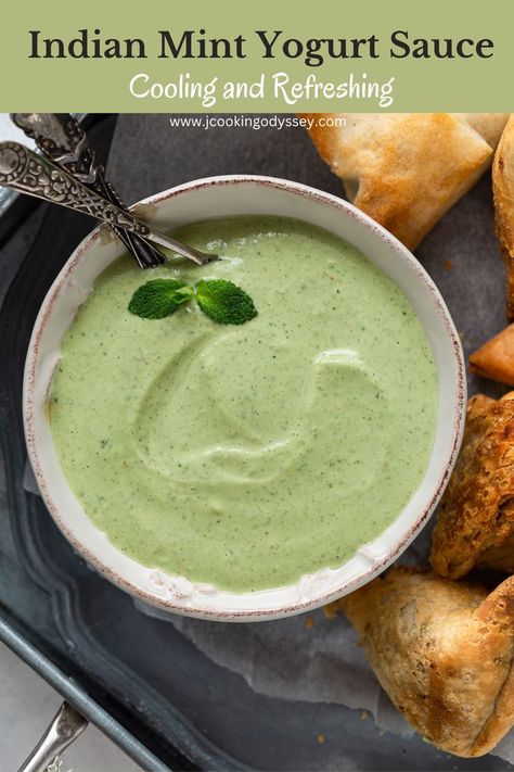 Indian mint yogurt chutney in a bowl with spoon Indian Yogurt Sauce, Indian Mint Sauce, Mint Raita Recipe, Mint Sauce Recipe, Mint Yogurt Sauce, Indian Sauces, Onion Bhaji, Cilantro Chutney, Mint Yogurt