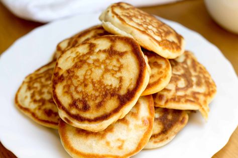 A plate full of freshly cooked, golden brown Scotch Pancakes Scotch Pancakes, Vegetarian Pancakes, Kids Pancakes, Pancake Mix Recipe, Drop Scones, Whole Wheat Pancakes, Wheat Pancakes, Mini Pancakes, Tasty Pancakes