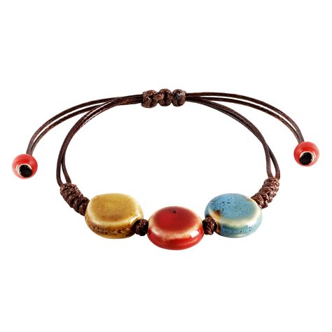 PRICES MAY VARY. VIBRANT HANDCRAFTED CERAMIC BEADS: Each bead on this bohemian bracelet is crafted from ceramic and uniquely colored, offering a vibrant spectrum from earthy greens to sunny yellows, making it a standout accessory. ADJUSTABLE LEATHER CORD: The robust leather cord is designed for longevity and comfort, featuring an adjustable knot that allows for a customized fit for any wrist size. PERFECT FOR LAYERING OR SOLO WEAR: Whether worn alone for a subtle hint of color or layered with ot Cute Bracelets To Make, Leather Macrame, Leather Cord Jewelry, Ceramic Bead Jewelry, Leather Beads, Earthy Greens, Ceramic Bracelet, Boho Cuff Bracelet, Jump Ring Jewelry