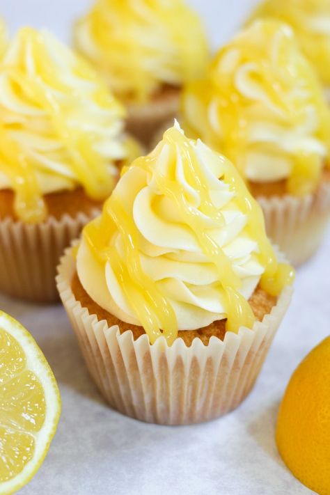 LEMON DRIZZLE CUPCAKES - An Easy, Zingy & Moist Little Cake Recipe! - These light, extra moist Lemon Drizzle Cupcakes are the perfect treat. Baked in just 20 minutes using a basic cupcake recipe, made even more delicious with the simple addition of a lemon juice drizzle, lemon buttercream and finished with some lemon curd. #cupcakes #lemoncupcakes #lemonbuttercream #lemonfrosting #tamingtwins Lemon Drizzle Cupcakes, Basic Cupcake Recipe, Cup Measurements, Lemon Cupcake, Cake Cup, Lemon Drizzle Cake, Lemon Buttercream, Drizzle Cake, Lemon Drizzle