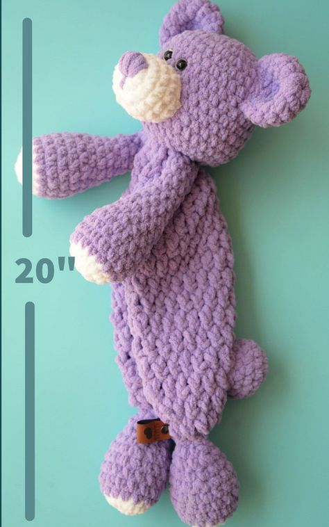 Make a classic teddy bear for the little one in your life with this crochet bear pattern! It is beginner-friendly and includes easy-to-read, step-by-step instructions. The finished bear would make a wonderful baby shower gift or birthday gift for your toddler. Crochet Animal Pattern Details Written in U.S. crochet terms in English Includes step-by-step instructions Delivered as PDF download Finished bear is 20 inches in length The body of the snuggler is unstuffed so it makes it easy for kids to carry around. If you're a fellow entrepreneur, you are also welcome to sell the finished piece! Snugglers are very popular at craft markets. Crochet Bear Pattern Materials 1 Skein of Bernat Blanket Baby; Baby Lilac 1 Skein of Bernat Blanket Baby; White 8mm and 10mm Crochet Hooks 1 Yarn Needle 1 Pai Crochet Bear Pattern, Crochet Baby Projects, Easy Beginner Crochet Patterns, Bear Patterns Free, Crochet Bear Patterns, Crochet Teddy Bear Pattern, Crochet Baby Toys, Crochet Animals Free Patterns, Crochet Teddy Bear