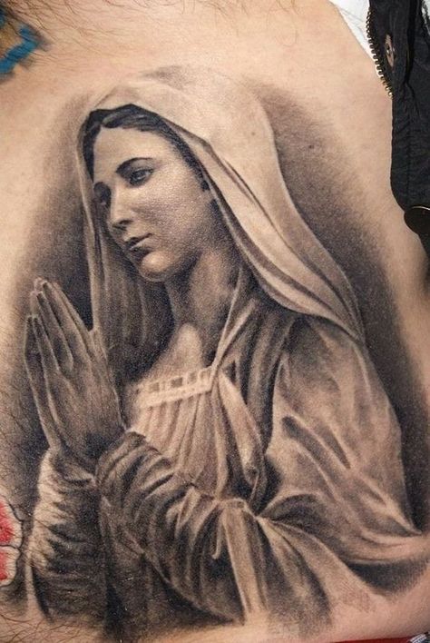 Catholic Mary tattoos with an explanation of their meanings: 50+ ideas in different styles with various elements for every taste. Bonus: the most popular tattoo spots. Rip Tattoos For Dad, Religious Tattoo Sleeves, Mother Mary Tattoos, Religion Tattoos, Catholic Tattoos, Virgin Mary Tattoo, Mary Tattoo, Christ Tattoo, Tattoo Spots