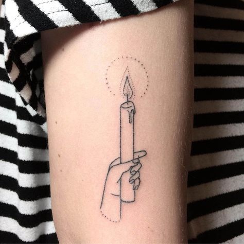 A tattoo of a hand holding a candle inked on the arm Hand Holding Candle Tattoo, Small Candle Tattoo, Tattoo Of A Hand, Hand Holding Candle, Illusion Photos, Holding Candle, Rose Tattoo Sleeve, Candle Tattoo, Ribcage Tattoo