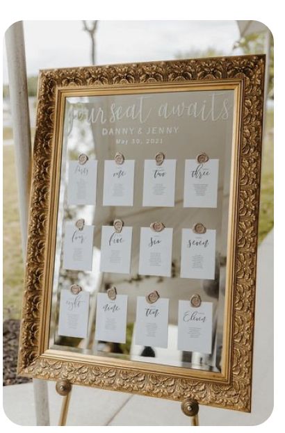 Boho Mirror Wedding Sign, Seating Chart Cards On Mirror, Seating Chart Wedding Ideas Picture Frame, Seating Chart On Glass Frame, Wedding Table Banquet Style, Table Numbers Wedding Chart, Seating Chart Wax Seal Mirror, Cute Place Cards Wedding, Mirror Wedding Sign Table Numbers