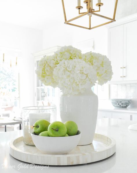 Beautiful white kitchen with gold accents. Bright and open with pretty blush accents. This lovely spring home tour is fresh and inviting. #springdecor #springdecorating #homedecor #whitefurnishings #openconcept #barstools #kitchen #kitchendecor White Home Accessories, Decoration Hall, Kitchen Vignettes, Kitchen Countertop Decor, Countertop Decor, Kitchen Island Decor, Spring Decorating, Counter Decor, Accessories Kitchen