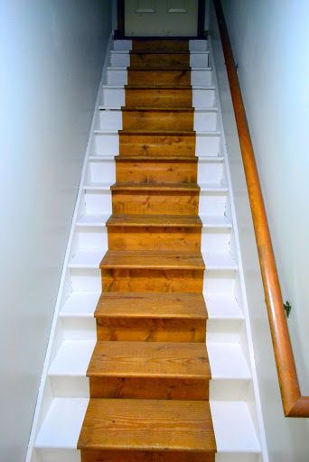 Hometalk :: Painted Staircase - Bare Wood 'Runner' Painted Stairway, Dark Stairwell, Step Makeover, Basement Stair Lighting, Painted Staircase, Basement Stairs Remodel, Diy Stair Railing, Staircase Pictures, Basement Stairs Ideas