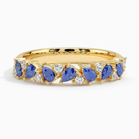 Olivetta Sapphire and Diamond Wedding Ring - 18K Yellow Gold. This beautiful ring evokes femininity and romance with scattered sapphires and diamonds that shimmer along the top of the band (1/10 total carat weight). Montana Sapphire Wedding Band, Rose Gold Round Diamond Ring, Diamond And Sapphire Wedding Band, Gold Round Diamond Ring, Jewelry Redesign, Sapphire Gold Ring, Blue Sapphire Wedding Band, Blue Wedding Band, Sapphire Eternity Ring