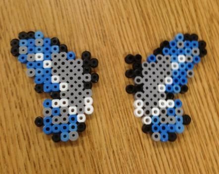 A butterfly flapping its wings.. .  Make a beaded animal in under 60 minutes by creating, beading, and beading with perler beads, ironing paper, and flat iron. Inspired by kawaii, butterflies, and butterflies. Creation posted by Conn.  in the Art section Difficulty: Simple. Cost: Cheap. Perler Beads Butterfly, Perler Bead Butterfly, Bead Butterfly, Beads Butterfly, Easy Perler Bead Patterns, Pearl Beads Pattern, Easy Perler Beads Ideas, 3d Perler Bead, Fuse Bead Patterns