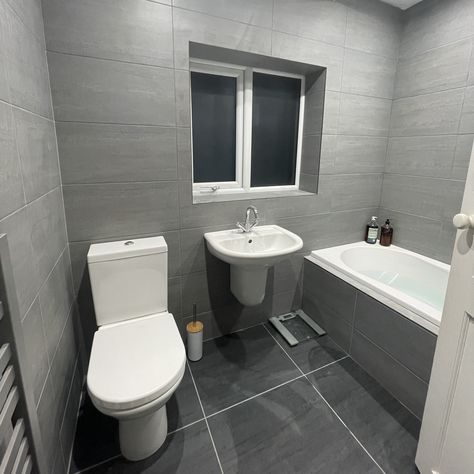 Inara Concrete and Coal | Topps Tiles Toilet Tiles Design, Grey Bathroom Floor, Fully Tiled Bathroom, Gray And White Bathroom, Toilet Tiles, Toilet Decor, Grey Bathroom Tiles, Shower Rooms, Tile Adhesive