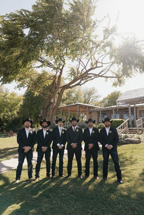 Cowboy Theme Wedding Outfit, Serious Wedding Poses, Black Suit With Cowboy Boots, Groomsmen Attire Boots, Groom Attire With Boots, Black Suit With Cowboy Hat, Western Groomsmen Attire Country, Dark Groomsmen Attire, Grooms Wearing Hats