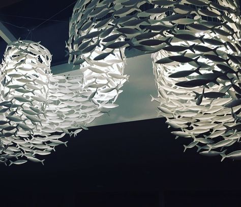 Custom made Shoal sculpture above dining table. Each fish, made by hand in the Staffordshire Potteries, from fine bone china. Fish Lighting, Fish Installation, Ocean Room, Ceramic Fish, Deck Decorating, Bioshock, Sochi, Cute Room Decor, Fish Art