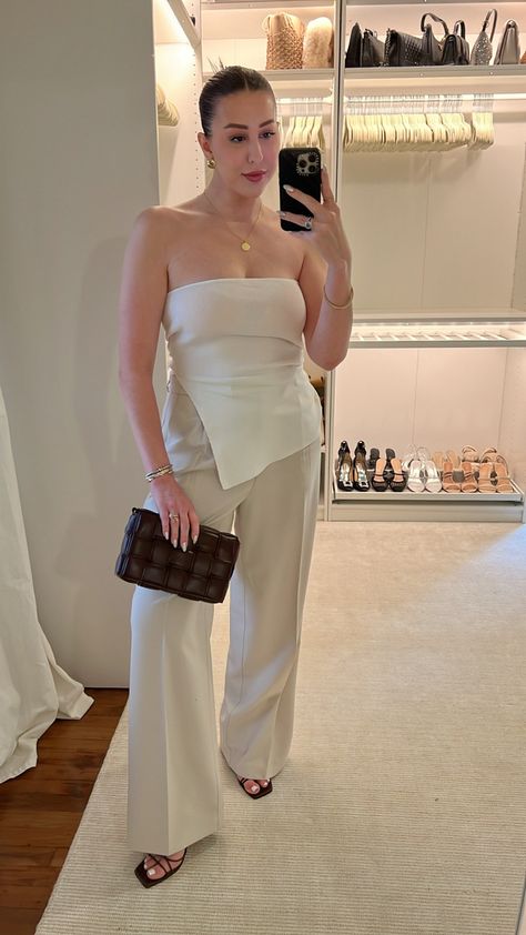 Minimal clean aesthetic with wide leg trouser style with a strapless white ribbed top and bottega handbag Styling With Kenzie, Bottega Handbag, Wide Shoulders Women Outfits, Strapless Top Outfit, Minimal Summer Outfit, Neutrals Outfit, Summer Outfit Style, Thick Earrings, Off The Shoulder Top Outfit