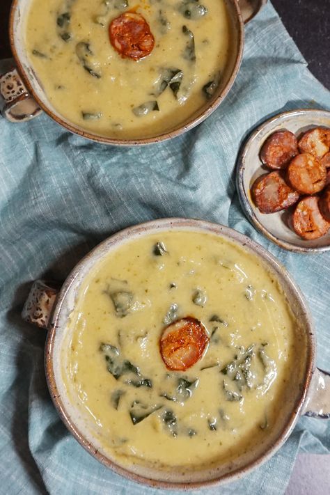 Creamy (yet dairy free) Caldo Verde soup... a keto-friendly take on the traditional Portuguese Kale Soup! Linguiça (or Chouriço) are the star, with lots of low-carb veggies mixed in for a cozy bowl of flavor. ModernYum.com #modernyum #keto #lowcarb #caldoverde #soup #ketosoup #portuguesefood #linguica #sausage #chourico #chorizo #linguiça #chouriço Portuguese Sausage Soup, Caldo Verde Soup, Verde Soup, Portuguese Kale Soup, Portuguese Soup, Turnip Soup, Keto Soups, Low Carb Veggies, Kale Soup