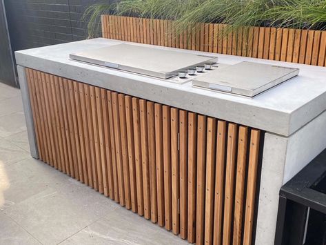 6. Concrete Outdoor Kitchen with Timber Battens and Planter Box - Torquay | outdoor kitchen & architectural concrete Outdoor Kitchen Ideas Covered, Concrete Outdoor Kitchen, Architectural Concrete, Outdoor Bbq Area, Kitchen 2024, Timber Battens, Outdoor Barbeque, Backyard Design Ideas, Modern Outdoor Kitchen