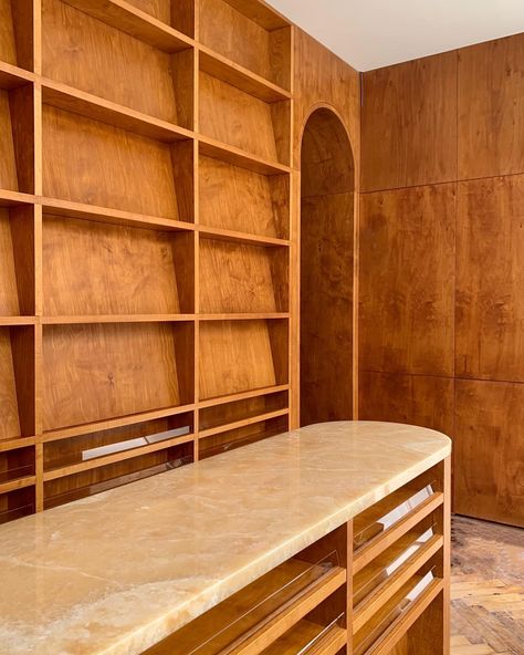 Front kiosk of the renovated @shreejinews store on Chiltern Street in stained plywood and honey onyx. All masterfully assembled and… | Instagram Lobby Table, Stained Plywood, Sheila Hicks, Kiosk, Store Design, Plywood, Reno, New Look, Onyx