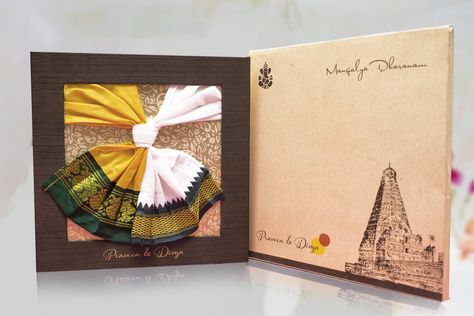 Indian creative Hindu wedding Invitation which brings the ancient and modern design together in the Wedding Invitation. This card depicts the Tamil culture where saree and dhoti are worn during the south Indian marriages. This wedding invite can use in all culture and it is one of the unique wedding card for Hindu traditional, The card can be modified accordingly for the user need. #sareedhoticard #indianweddingcard #weddingcard #tamilwedding #southindianmarriage Traditional Indian Wedding Cards, Book Themed Wedding Invitations, Hindu Wedding Invitation Cards, Book Themed Wedding, Marriage Invitation Card, Hindu Wedding Invitations, Unique Wedding Cards, Hindu Wedding Cards, Indian Wedding Invitation Cards