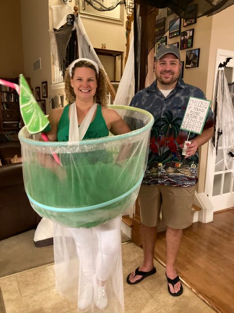 DIY margaritta glass costume for a Jimmy Buffett couples costume. Margaritta glass is made if tulle, hula hoops, ribbon and bubble wrap. Straw is made if pvc pipe and decorated with colored duct tape. Oversized lime is made of papier-mâché. Jimmy Buffet Halloween Costume, Diy Drink Costume, Cocktail Costumes Diy, Margaritaville Costume, Jimmy Buffet Costume Ideas, Jimmy Buffet Costume, Cocktail Costume, Margarita Costume, Margaritaville Party