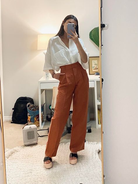 Terracotta Pants Outfit, Rust Colored Wide Leg Pants Outfit, Flowy Brown Pants Outfit, Burnt Orange Trousers Outfit, Burnt Orange Pants Outfit Work, Terracotta Pants Outfits, Orange Trousers Outfit, Ceo Wardrobe, Camel Pants Outfit