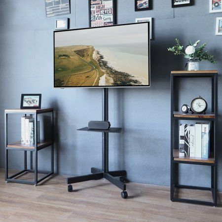 #tvstand #portabletvstand #movingtv #homeorganizer #collegedorm #collegeessential #apartmentessential #homefurniture #homeorganizer Tv On Wheels Tv Stands, Mobile Tv Cart, Portable Tv Stand On Wheels, Moving Tv Stand, Dorm Tv Stand, Diy Tv Mounting, Dorm Tv, Av Carts, Portable Tv Stand