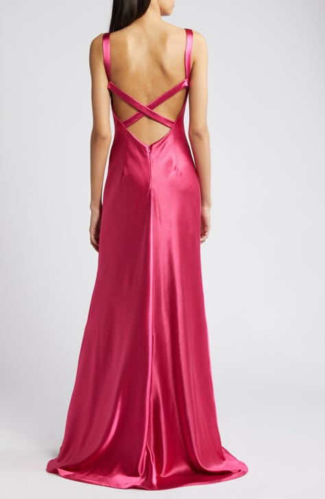 Elevate your next event look in this gorgeous satin gown designed with a sleek V-neckline, cross-back straps and a draped, body-defining silhouette. 59" length; 9" train (size Medium) Hidden back-zip closure V-neck Sleeveless Partially lined 97% polyester, 3% spandex Hand wash, line dry Imported Coastal Formal Dress, Raspberry Pink Dress, Prom Dress With Cutouts, Eclectic Formal Dresses, Bright Pink Prom Dresses, Corset Back Prom Dress, Orange And Pink Bridesmaid Dresses, Silk Prom Dresses, Pink Silk A-line Evening Dress