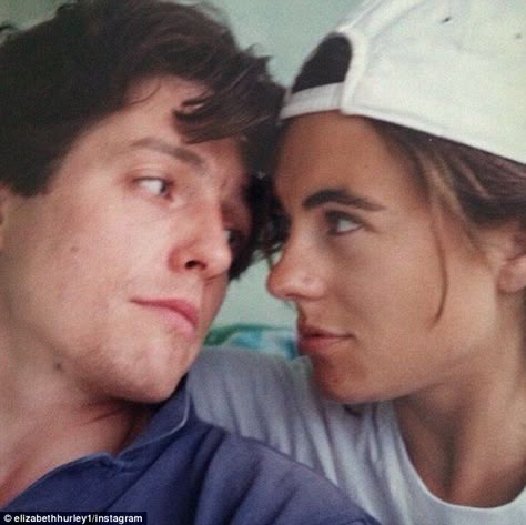 Throwback Thursday: While they may no longer hold a torch for one another, it seems that E... Elizabeth Hurley Hugh Grant, Uk Actors, White Wrap Dress, Myrna Loy, Hugh Grant, The Royals, Elizabeth Hurley, Rita Hayworth, Joan Crawford