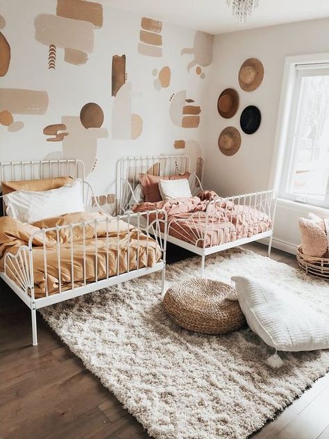 With its laid-back vibe, plentiful textures, emphasis on color, and layered patterns, the "boho" look is sure to please even the pickiest members of your family. Here are nine boho girls' rooms that any young lady would be happy to call their own. #hunkerhome #boho #girlsroom #bohobedroom #girlsbedroomideas Boho Girls Room, Shared Girls Room, Toddler Girl Room, Twin Beds, Kids Room Inspiration, Shared Room, Toddler Rooms, Nursery Baby Room, Toddler Bedrooms