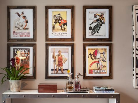 10 Sports-Themed Designer Spaces for True Fans | HGTV's Decorating & Design Blog | HGTV Mid Century Artwork, Vintage Lockers, Downtown Lofts, Concrete Column, Mid Century Modern Living, Medal Display, Living Room Prints, Mid Century Modern Living Room, Sports Room