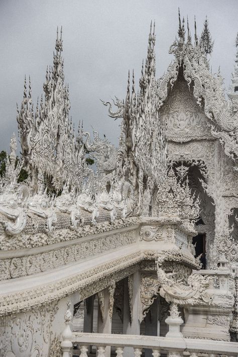 This White Temple In Thailand Is Both Heaven And Hell Wat Rong Khun, Beautiful Temple, White Architecture, 2k Wallpaper, White Temple, Flatiron Building, Chiang Rai, Heaven And Hell, Beautiful Places To Travel