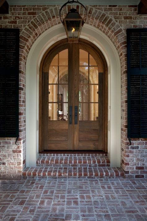 Simple 3/4 lite arched door Arched Front Door, Brick Steps, Porte Cochere, Gas Lanterns, Front Door Entrance, Arched Doors, House With Porch, Front Entrance, Glass Front Door