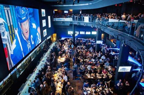 Real Sports Bar and Grill | © Real Sports Bar and Grill Sport Bar Design, Sports Pub, Sports Bars, Nightclub Bar, Nightclub Design, Pub Design, Toronto Restaurants, Sports Arena, Bar Design Restaurant