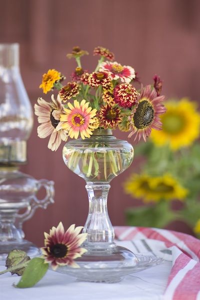 50 Hot Yard Sale and Flea Market Finds (and How to Use them in Your Wedding): Part One Oil Lamp Decor, Oil Lamp Centerpiece, Yard Sale Finds, Antique Oil Lamps, Flea Market Finds, Mason Jar Wine Glass, Glass Vases, Oil Lamp, Beautiful Vase