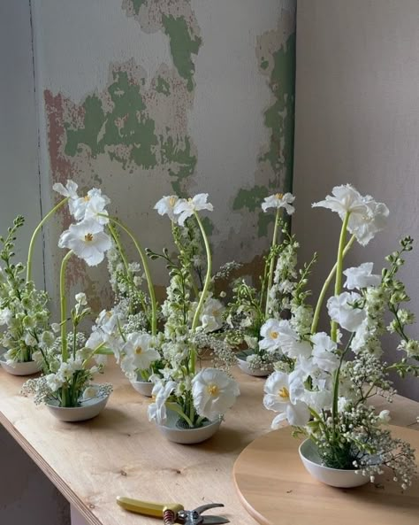 Jess Gring (@odd.flowers) • Instagram photos and videos European Wedding Bouquet, Pastel Flowers Arrangements, Plant Event Decor, City Wedding Flowers, Wedding Flowers With Tulips, Japandi Wedding Style, White Christmas Flower Arrangements, Pin Frog Flower Arrangement, Silver Dollar Eucalyptus Centerpiece