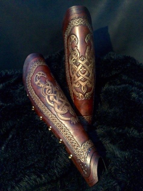 These are a pair of tall beautiful leather long leg greaves made out of layers of overlapping 3.5mm veg. tanned leather have been made by the Leather Greaves, Leather Working Patterns, Historical Armor, Black Raven, Cosplay Armor, Battle Armor, Leather Armor, Steampunk Costume, Leather Artisan