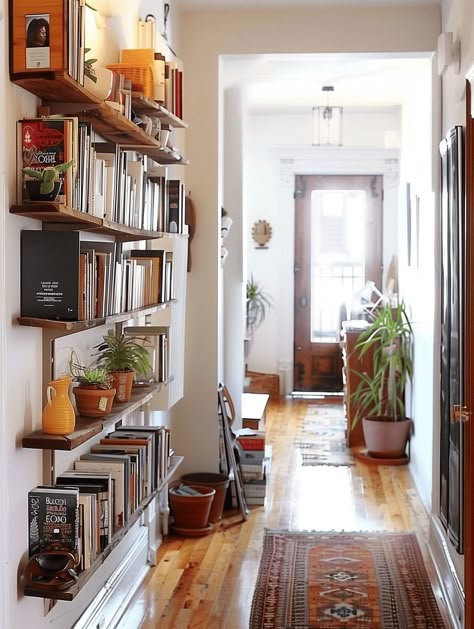 17 Narrow Entryway Ideas Long Narrow Entrance Hall Ideas, Entryway Bookshelf Ideas, Book Shelves Small Spaces, Studio Entryway Ideas, Narrow Apartment Design, Shelf In Hallway, Small Wall Bookshelf, Long Hallway Decorating Narrow, Bookshelf Ideas For Small Spaces