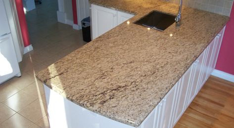 Giallo Ornamental on White Cabinets - Northern Marble & GraniteNorthern Marble & Granite Ornamental Granite Countertops, Giallo Ornamental Granite, Metal House Plans, White Cabinet, Island Countertops, Metal House, Kitchen Gallery, White Kitchen Cabinets, Marble Granite