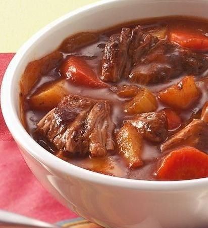 This classic is one of Betty’s most popular slow-cooker recipes! This traditional beef stew will bring you back to your childhood, thanks to a savory mixture of veggies, beef and beef bouillon. We use tapioca to thick here because it won’t break down over a long cooking time (unlike flour or cornstarch, which break down quickly and are best added at the end of the cooking time). Lamb Shank Stew, Short Rib Beef Stew, Wine Cafe, Old Fashioned Beef Stew, Wine Pizza, Root Vegetables Recipes, Paleo Vegetarian, Malt Beer, Lamb Stew