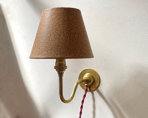 INTRODUCING: The Matilda Plug-in Sconce ✨ I am so proud to introduce this new plug-in wall lamp. Entirely handmade in our Los Angeles studio, we offer this cutie in either polished unlacquered brass or aged brass, and you can pair her with one of our five signature cloth cords colors. Do you like it? (Say yes) Available now ~ link in bio 👩‍💻 #sconce #mattalfordstudio #handmade #shopsmall #brass #antique #lamp #lighting #interiordesign Sconces With Lamp Shades, Shell Cottage, English Country Interiors, Plug In Wall Lamp, Country Interiors, Cottage Lighting, Midcentury Style, Country Interior, Big House