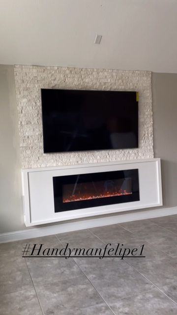 Handymanfelipe LLC on Instagram: "Floating Fireplace 🔥with Stone wall #livingroomdecor #livinroom #livingroomideas #livingroomdesign #livingroominspo #master #masterbedroom #madterbedroomdecor #floatingfireplace #accentwall #accentwalls #accentwallideas" Floating Fireplace Ideas With Tv, Wall Mount Tv And Fireplace Ideas, Floating Electric Fireplace Bedroom, Floating Mantle Electric Fireplace, Floating Fireplace Wall, Wall Mounted Electric Fireplace Under Tv, Fireplace On Wall, Accent Wall With Fireplace And Tv, Wall Mount Fireplace Ideas