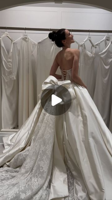 Kleinfeld Bridal on Instagram: "Bow down to style! 🎀 Discover the enchanting #5057 by @PninaTornai this weekend at #Kleinfeld. With its sheer Alençon lace bodice, dramatic satin skirt, and statement-making bow—every detail is meticulously designed. From June 26th to 30th, explore the exclusive Utopia collection and more. Don’t miss your chance to find a gown that’s as unique as you are—book your appointment via the link in bio." Kleinfeld Bridal, Alencon Lace, Satin Skirt, Lace Bodice, How To Make Bows, This Weekend, Wedding Gowns, Link In Bio, Bodice