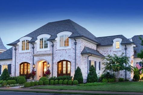 Castle Homes was the first Nashville builder to offer customers’ guaranteed pricing. Ranch House Exterior Colors, French Country Landscaping, Castle Homes, French Country Estate, French Provincial Home, Ranch House Exterior, House Beautiful Magazine, Castle Home, French Style Homes