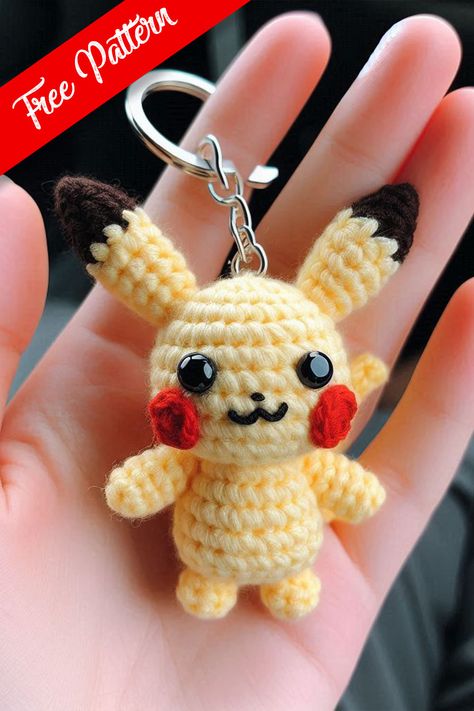 This delightful crocheted Pikachu keychain captures the essence of one of the most beloved Pokémon characters in a fun and fashionable accessory. Disney Free Crochet Patterns, Crocheted Pikachu, Crochet Disney Characters, Crochet Keychain Pattern Free Easy, Crochet Keychain Free Pattern, Mini Crochet Animals, Pikachu Keychain, Crochet Keyring Free Pattern, Crochet Keychain Ideas