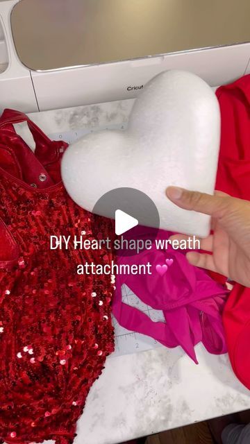 Latoya | Holiday Decor•Party Decor•DIY on Instagram: "Take this as your sign to order your Valentine’s Day wreath from this Coilygirl💁🏾‍♀️
.
.💕 DIY heart-shaped wreath attachment💕.
.
As you requested we are gearing up for Valentine’s Day and of course we have to get started on a few DIY’s for the new season. I used a foam heart from @dollar tree and some scrap materials I had in my stash. 
.
.
Now that bathing suit 👀 it was thrown in the fabric bin bc the wrong size was grabbed but it was to late to take it back but shout out to @jcpenney for their clearance deals bc it was only $10/$15….we gonna use that pink on another attachment 💁🏽‍♀️.
.
Drop a ❤️ in the comments if the finished product is giving you the #valentines day feels💕.
.
.
#diy #valentinesdaywreath #wreath #decor #sequi Valentines Wreath, Heart Shaped Wreaths, Diy Heart, Take It Back, Scrap Material, Valentine Wreath, Fabric Bins, Diy Party Decorations, Wreath Decor