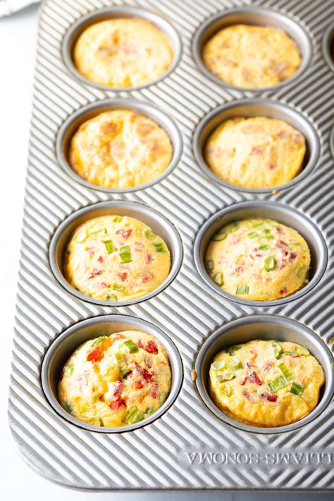 Metal muffin tin with baked egg bites. Baked Eggs In Muffin Tin, Egg Bites Muffin Tins, Baked Egg Bites, Starbucks Egg Bites Recipe, Bacon Bites, Eggs In Muffin Tin, Toddler Picky Eater, Christmas Main Dishes, A Spicy Perspective