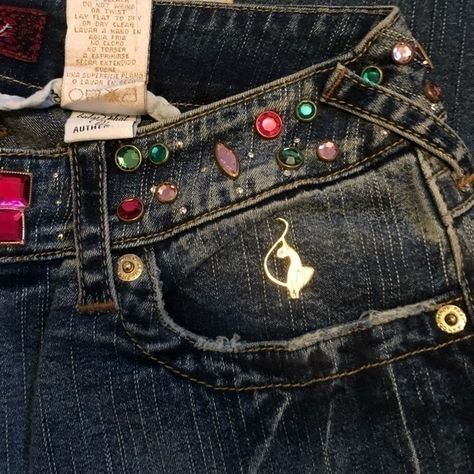 New With Tags. These Jeans Are One Of A Kind. The Rhinestones Are So Pretty. The Embroidery On The Back Pocket Is So Much Fun. The Style Is Boot Cut With Interesting Distressing On The Cuff. I Love The Weathered Or Distressing Appearance. The Fabric Content Is 96% Cotton And 4% Spandex. You Are Going To Feel So Glamorous In These Jeans. Thanks For Stopping By! #1522 Baby Phat Jeans, Bedazzled Jeans, Mcbling Fashion, Embroidered Pocket, Baby Phat, How To Stretch Boots, Star Jeans, Cute Jeans, Boot Cut Denim