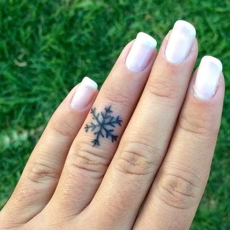 Small Hand Tattoo Ideas, Small Snowflake Tattoo, Winter Babies, A Small Tattoo, Winter Tattoo, Snow Tattoo, Hand Tattoo Ideas, Thumb Tattoos, Snow Flake Tattoo