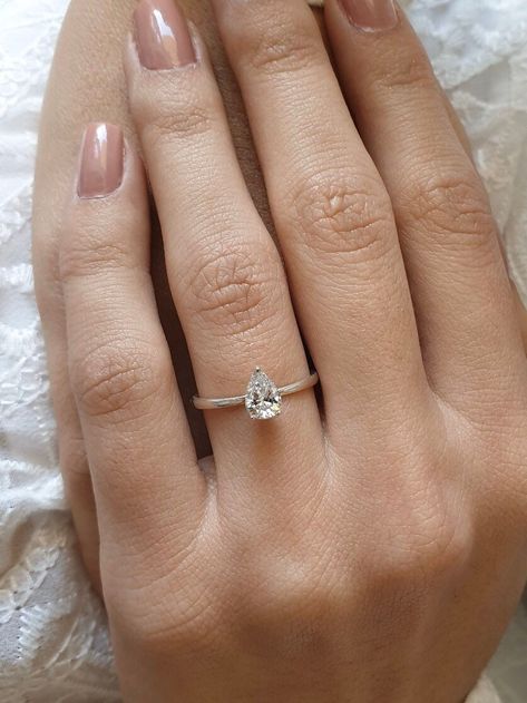 Engagement Ring Gold Simple, Pear Cut Engagement Ring, Engagement Ring Ideas, Pear Shaped Engagement Ring, Engagement Ring Simple, Small Engagement Rings, Pear Shaped Diamond Engagement Rings, Pear Moissanite Engagement Ring, Pear Shaped Diamond Ring